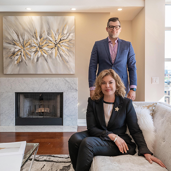Iryna and Alexander Galevska together in a living room